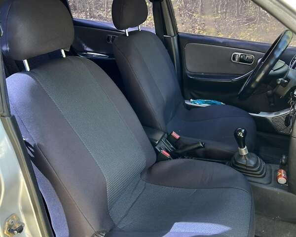 Сірий Ніссан Прімера, об'ємом двигуна 2 л та пробігом 337 тис. км за 2100 $, фото 8 на Automoto.ua