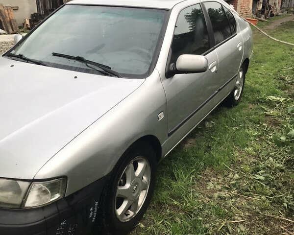 Серый Ниссан Примера, объемом двигателя 1.6 л и пробегом 370 тыс. км за 1150 $, фото 2 на Automoto.ua