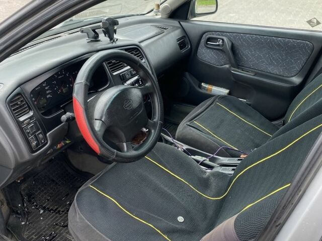 Серый Ниссан Примера, объемом двигателя 2 л и пробегом 420 тыс. км за 1300 $, фото 7 на Automoto.ua