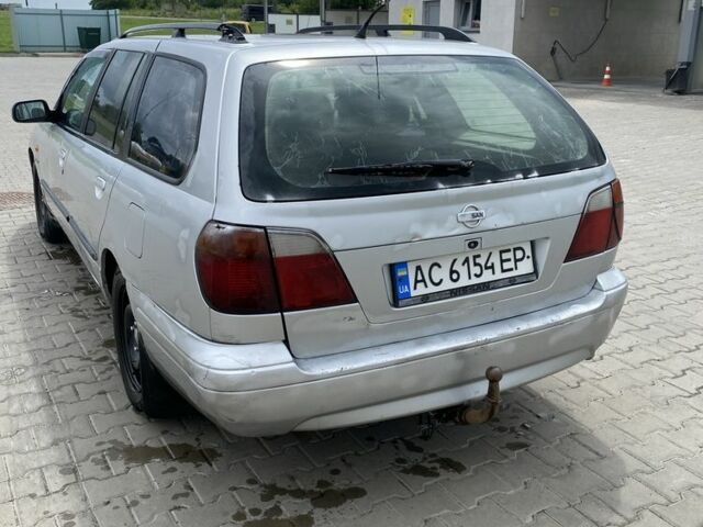 Серый Ниссан Примера, объемом двигателя 2 л и пробегом 420 тыс. км за 1300 $, фото 2 на Automoto.ua