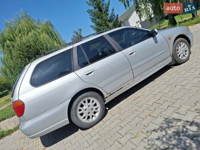 Серый Ниссан Примера, объемом двигателя 1.8 л и пробегом 286 тыс. км за 1800 $, фото 9 на Automoto.ua