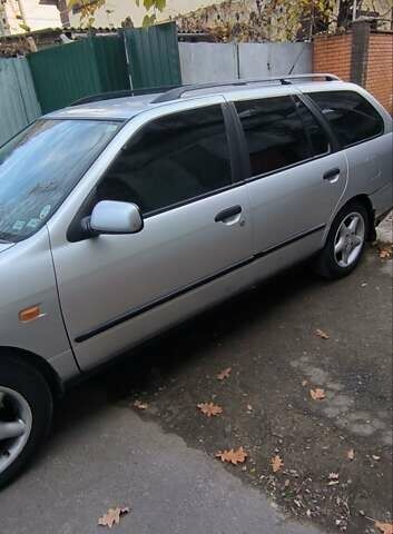 Серый Ниссан Примера, объемом двигателя 1.77 л и пробегом 277 тыс. км за 2900 $, фото 2 на Automoto.ua