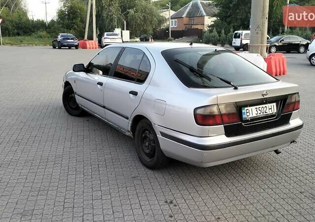 Сірий Ніссан Прімера, об'ємом двигуна 2 л та пробігом 350 тис. км за 2000 $, фото 6 на Automoto.ua