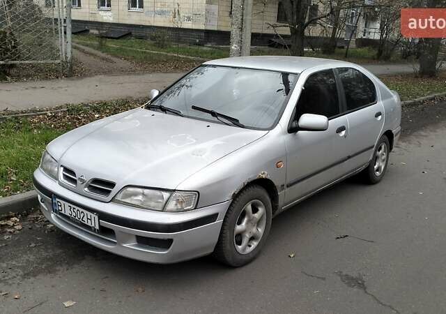 Сірий Ніссан Прімера, об'ємом двигуна 2 л та пробігом 350 тис. км за 2000 $, фото 1 на Automoto.ua