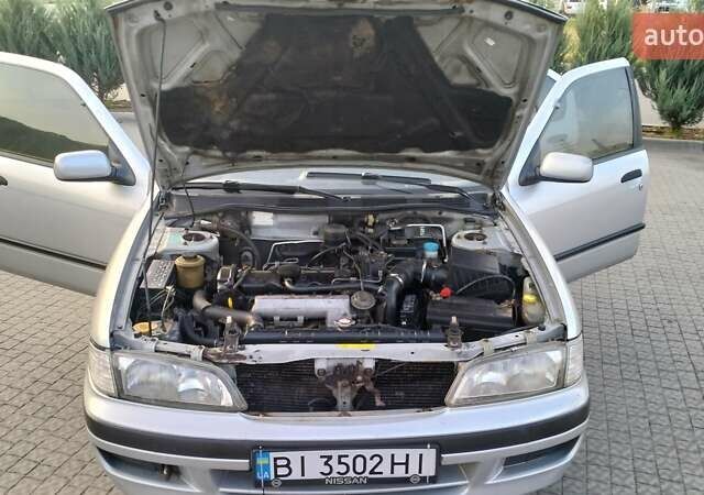 Сірий Ніссан Прімера, об'ємом двигуна 2 л та пробігом 350 тис. км за 2000 $, фото 5 на Automoto.ua