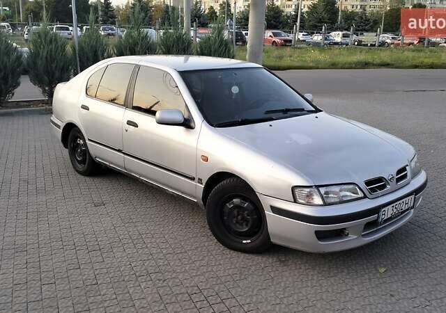 Сірий Ніссан Прімера, об'ємом двигуна 2 л та пробігом 350 тис. км за 2000 $, фото 8 на Automoto.ua