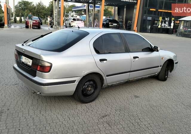 Сірий Ніссан Прімера, об'ємом двигуна 2 л та пробігом 350 тис. км за 2000 $, фото 7 на Automoto.ua