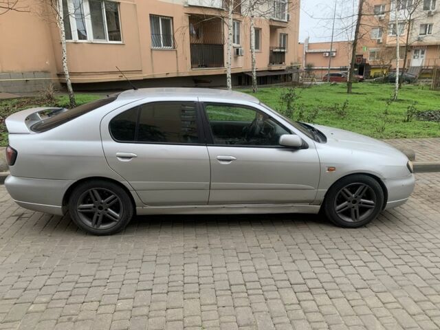 Сірий Ніссан Прімера, об'ємом двигуна 2 л та пробігом 300 тис. км за 3200 $, фото 5 на Automoto.ua