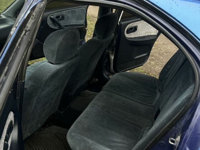 Синий Ниссан Примера, объемом двигателя 2 л и пробегом 355 тыс. км за 1350 $, фото 17 на Automoto.ua