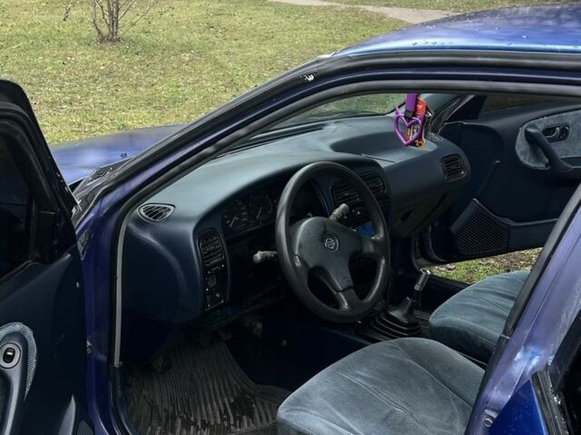 Синий Ниссан Примера, объемом двигателя 2 л и пробегом 355 тыс. км за 1350 $, фото 16 на Automoto.ua