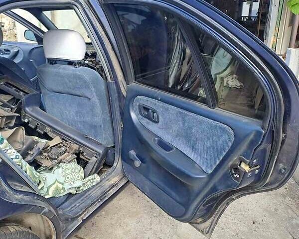 Синій Ніссан Прімера, об'ємом двигуна 1.6 л та пробігом 323 тис. км за 1000 $, фото 14 на Automoto.ua