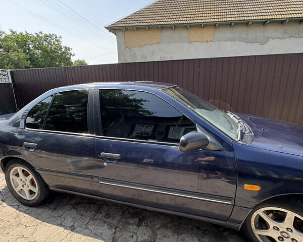 Синий Ниссан Примера, объемом двигателя 1.6 л и пробегом 340 тыс. км за 1400 $, фото 2 на Automoto.ua