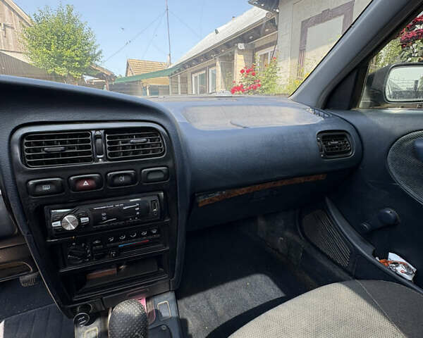Синий Ниссан Примера, объемом двигателя 1.6 л и пробегом 340 тыс. км за 1400 $, фото 12 на Automoto.ua