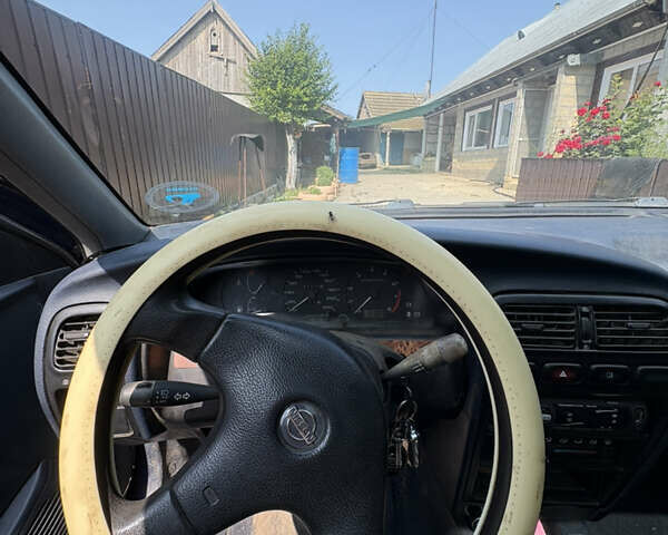 Синий Ниссан Примера, объемом двигателя 1.6 л и пробегом 340 тыс. км за 1400 $, фото 10 на Automoto.ua