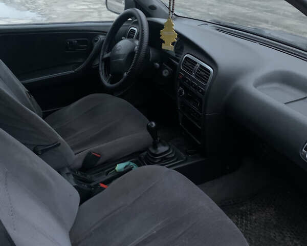 Синий Ниссан Примера, объемом двигателя 2 л и пробегом 300 тыс. км за 1600 $, фото 4 на Automoto.ua