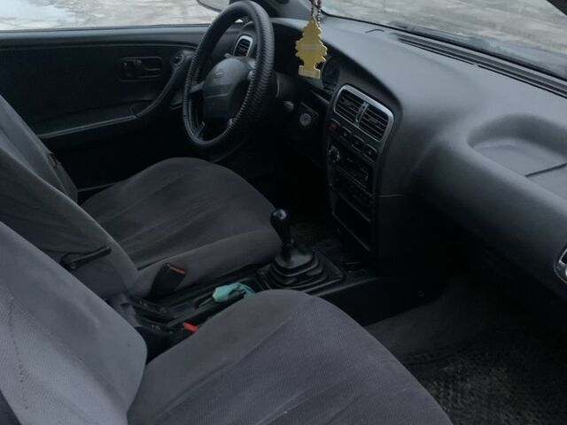 Синий Ниссан Примера, объемом двигателя 2 л и пробегом 300 тыс. км за 1900 $, фото 4 на Automoto.ua