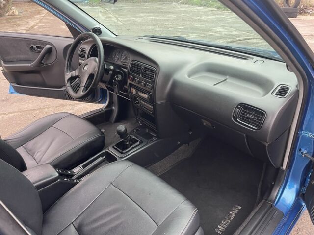 Синий Ниссан Примера, объемом двигателя 1.6 л и пробегом 296 тыс. км за 2700 $, фото 10 на Automoto.ua