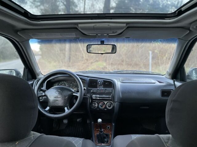 Синій Ніссан Прімера, об'ємом двигуна 2 л та пробігом 380 тис. км за 2100 $, фото 8 на Automoto.ua