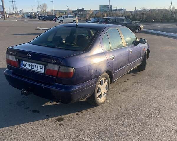 Синій Ніссан Прімера, об'ємом двигуна 2 л та пробігом 400 тис. км за 1600 $, фото 3 на Automoto.ua