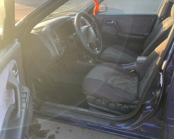 Синій Ніссан Прімера, об'ємом двигуна 2 л та пробігом 400 тис. км за 1600 $, фото 4 на Automoto.ua