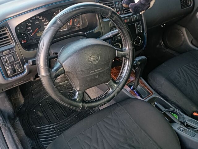 Синій Ніссан Прімера, об'ємом двигуна 2 л та пробігом 270 тис. км за 2800 $, фото 7 на Automoto.ua