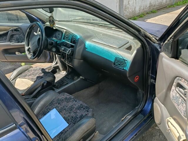 Синий Ниссан Примера, объемом двигателя 2 л и пробегом 300 тыс. км за 1800 $, фото 5 на Automoto.ua