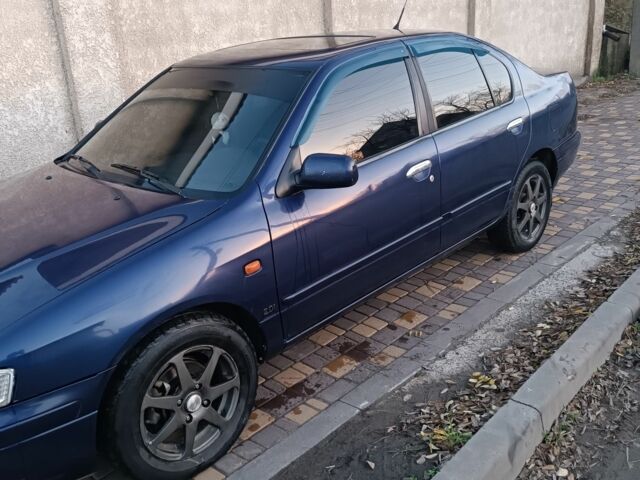 Синій Ніссан Прімера, об'ємом двигуна 2 л та пробігом 270 тис. км за 2800 $, фото 2 на Automoto.ua