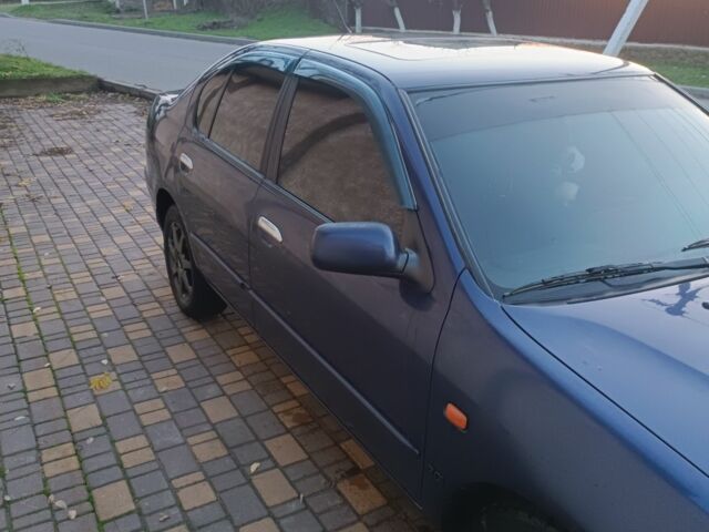 Синій Ніссан Прімера, об'ємом двигуна 2 л та пробігом 270 тис. км за 2800 $, фото 1 на Automoto.ua