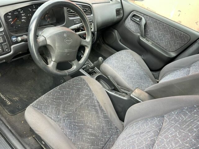 Синій Ніссан Прімера, об'ємом двигуна 2 л та пробігом 200 тис. км за 1000 $, фото 5 на Automoto.ua