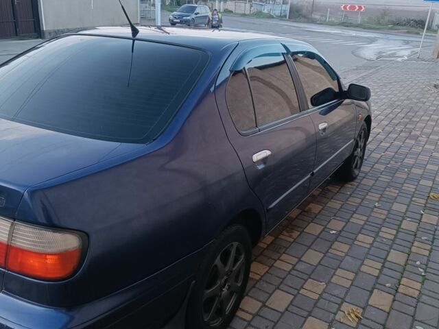 Синій Ніссан Прімера, об'ємом двигуна 2 л та пробігом 270 тис. км за 2800 $, фото 3 на Automoto.ua