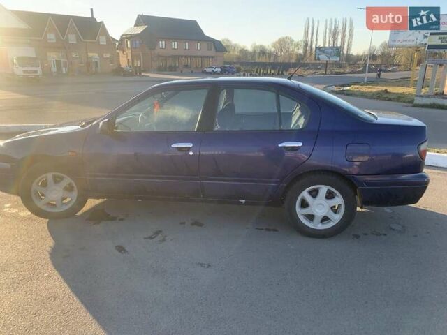 Синій Ніссан Прімера, об'ємом двигуна 2 л та пробігом 400 тис. км за 1600 $, фото 7 на Automoto.ua