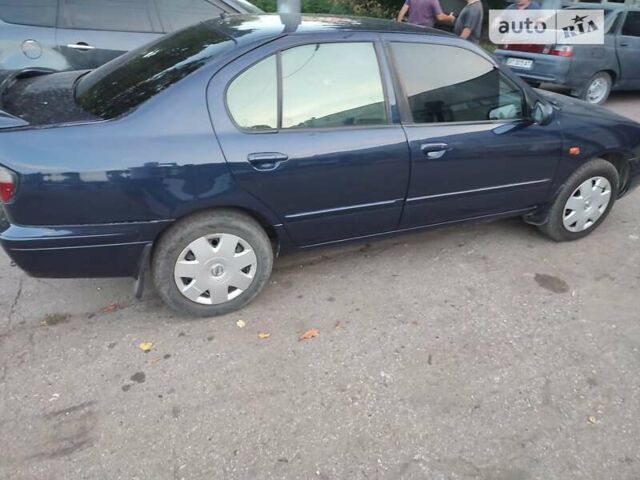 Синій Ніссан Прімера, об'ємом двигуна 2 л та пробігом 400 тис. км за 2200 $, фото 5 на Automoto.ua