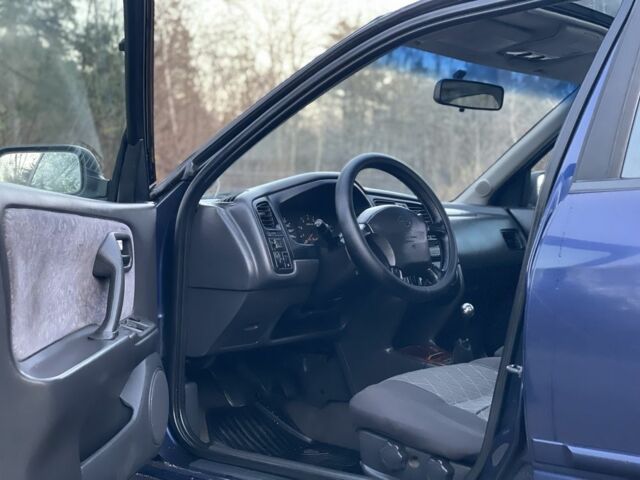 Синій Ніссан Прімера, об'ємом двигуна 2 л та пробігом 380 тис. км за 2100 $, фото 5 на Automoto.ua