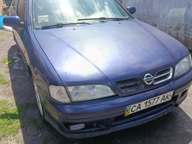 Синий Ниссан Примера, объемом двигателя 2 л и пробегом 300 тыс. км за 1800 $, фото 1 на Automoto.ua