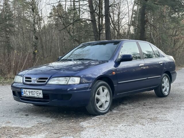 Синій Ніссан Прімера, об'ємом двигуна 2 л та пробігом 380 тис. км за 2100 $, фото 2 на Automoto.ua