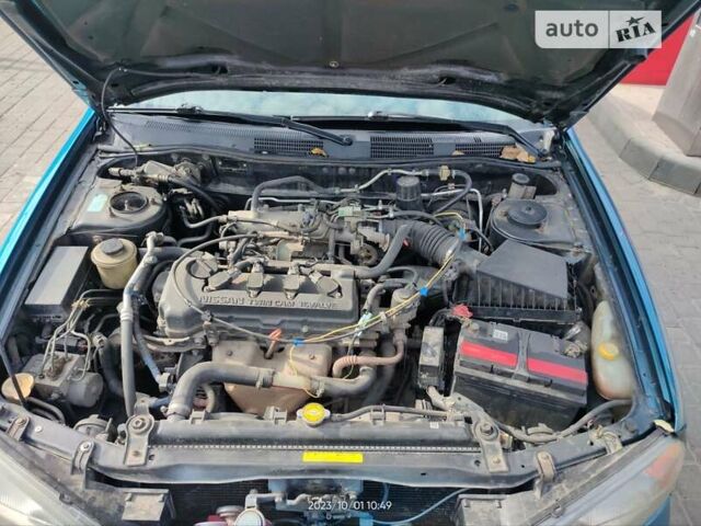 Синий Ниссан Примера, объемом двигателя 1.8 л и пробегом 256 тыс. км за 3750 $, фото 9 на Automoto.ua