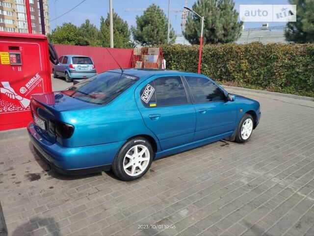 Синий Ниссан Примера, объемом двигателя 1.8 л и пробегом 256 тыс. км за 3750 $, фото 3 на Automoto.ua