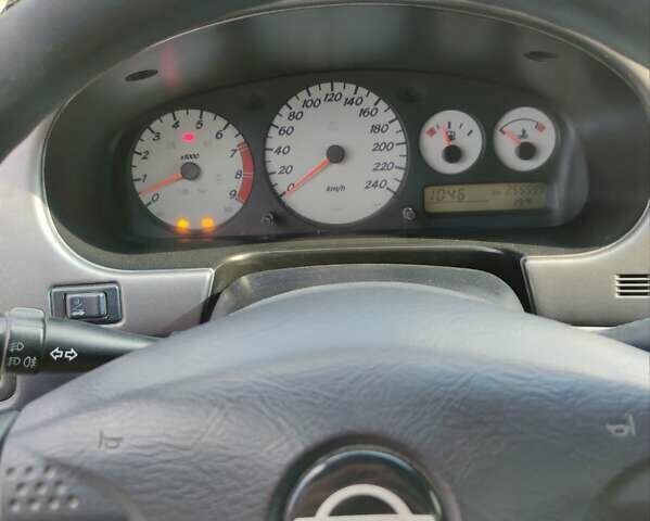 Синий Ниссан Примера, объемом двигателя 1.8 л и пробегом 256 тыс. км за 3750 $, фото 5 на Automoto.ua