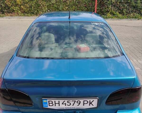 Синий Ниссан Примера, объемом двигателя 1.8 л и пробегом 256 тыс. км за 3750 $, фото 1 на Automoto.ua