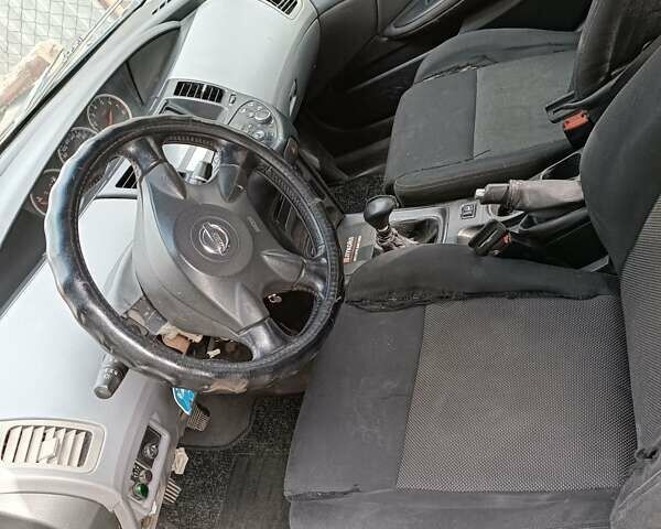 Синий Ниссан Примера, объемом двигателя 1.8 л и пробегом 250 тыс. км за 1799 $, фото 4 на Automoto.ua