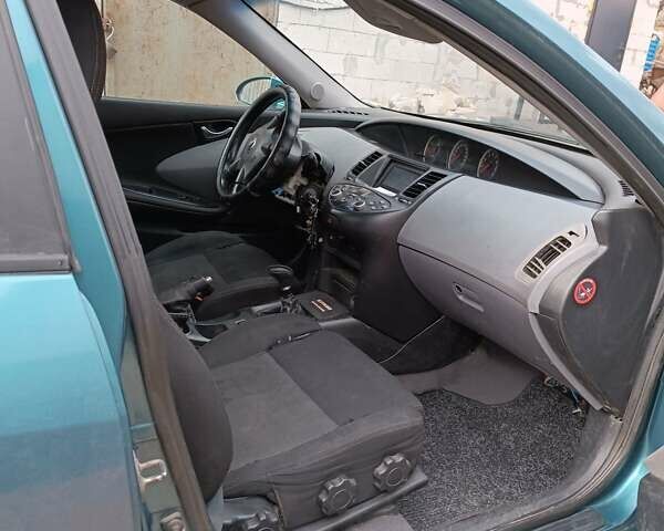 Синий Ниссан Примера, объемом двигателя 1.8 л и пробегом 250 тыс. км за 1799 $, фото 6 на Automoto.ua