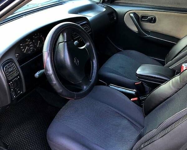 Синий Ниссан Примера, объемом двигателя 1.6 л и пробегом 316 тыс. км за 2000 $, фото 3 на Automoto.ua