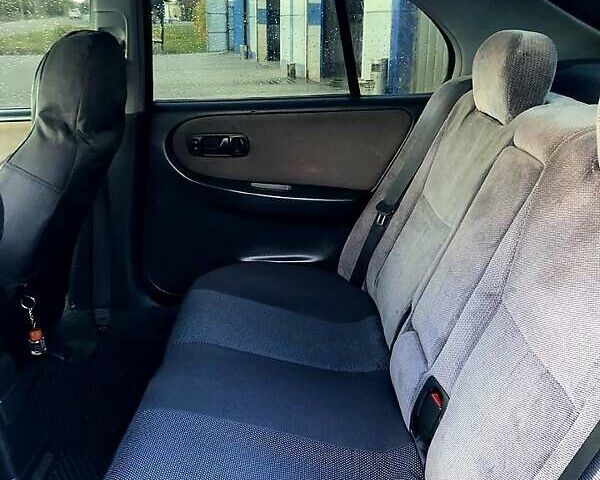 Синий Ниссан Примера, объемом двигателя 1.6 л и пробегом 316 тыс. км за 2000 $, фото 6 на Automoto.ua