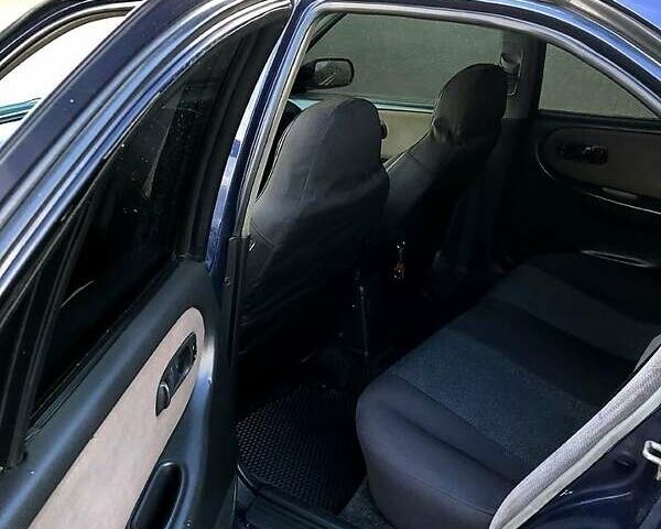 Синий Ниссан Примера, объемом двигателя 1.6 л и пробегом 316 тыс. км за 2000 $, фото 5 на Automoto.ua