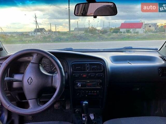 Синий Ниссан Примера, объемом двигателя 1.6 л и пробегом 316 тыс. км за 2000 $, фото 4 на Automoto.ua