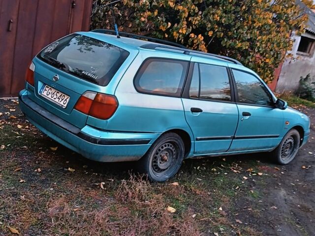 Синій Ніссан Прімера, об'ємом двигуна 1.6 л та пробігом 223 тис. км за 719 $, фото 2 на Automoto.ua