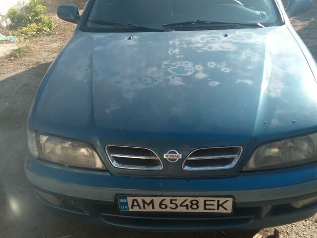 Синий Ниссан Примера, объемом двигателя 1.6 л и пробегом 390 тыс. км за 1000 $, фото 2 на Automoto.ua