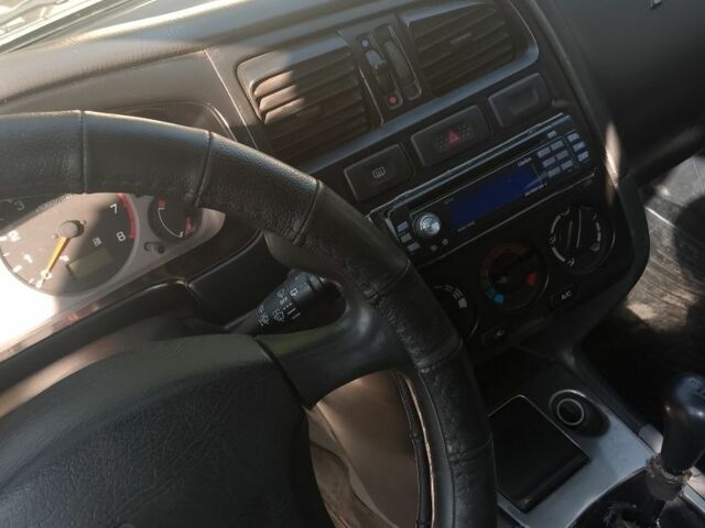 Синий Ниссан Примера, объемом двигателя 1.6 л и пробегом 390 тыс. км за 1000 $, фото 3 на Automoto.ua