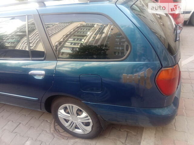 Синий Ниссан Примера, объемом двигателя 2 л и пробегом 477 тыс. км за 2800 $, фото 15 на Automoto.ua