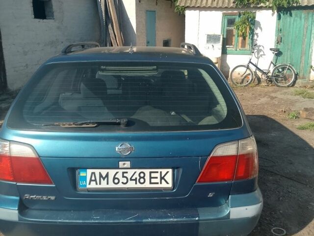 Синий Ниссан Примера, объемом двигателя 1.6 л и пробегом 390 тыс. км за 1000 $, фото 1 на Automoto.ua